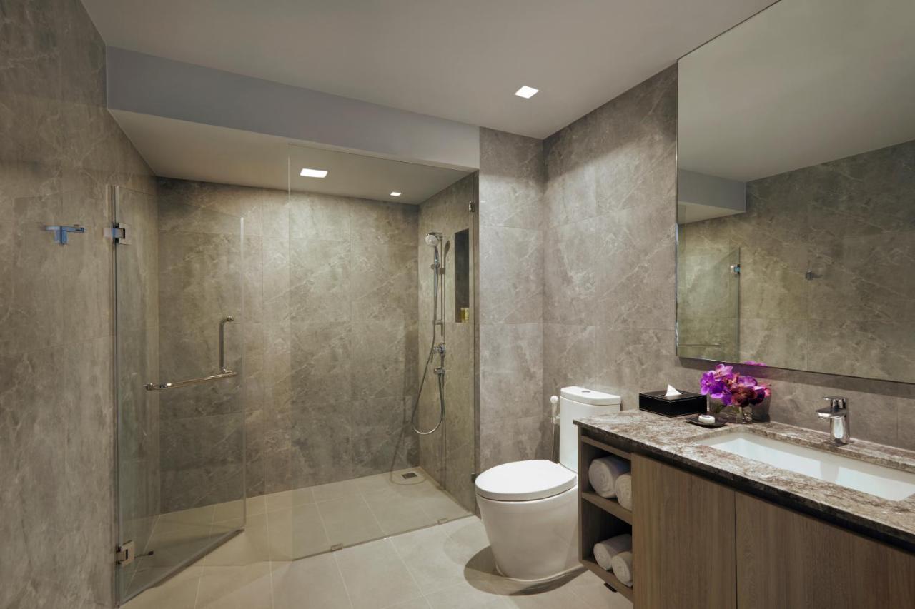 Somerset Rama 9 Bangkok Dış mekan fotoğraf A wet bathroom in Singapore